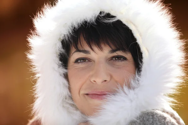 Woman with fluffy hood — Stock Photo, Image