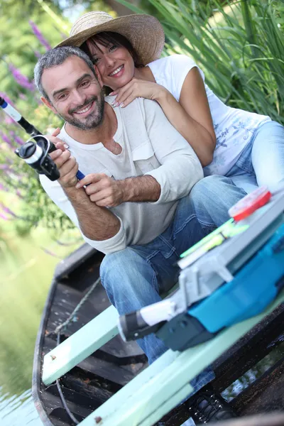 Man and woman fishing on the river — Stock Photo, Image