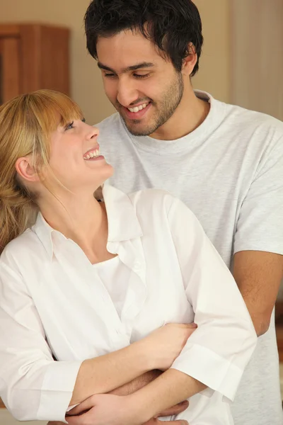 In-love couple in kitchen — Stock Photo, Image