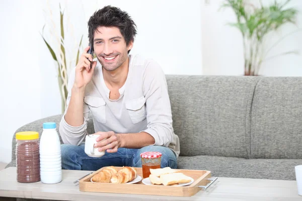 Portrait of a man at breakfast — Stock Photo, Image