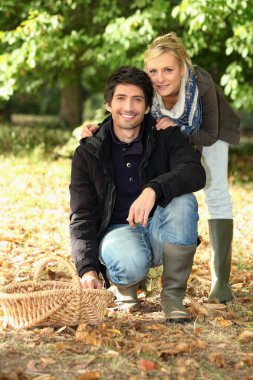 Couple going mushroom picking. clipart