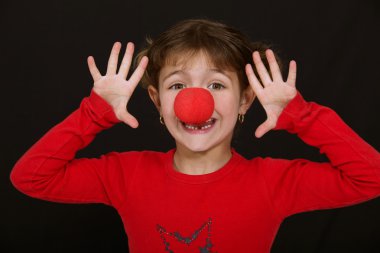 Little girl clowning around clipart