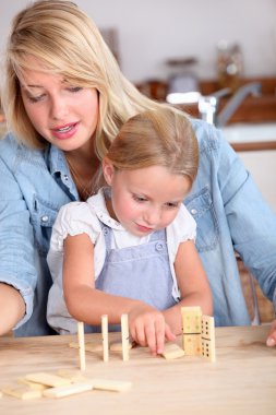 Portrait of a mother and daughter clipart