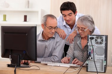 Family on computer clipart