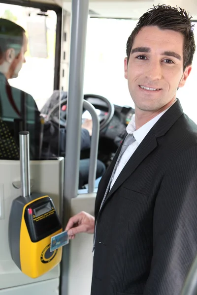 Commuter swiping his tram ticket — Stock Photo, Image