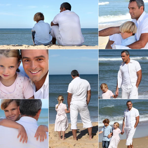 Человек с детьми на пляже — стоковое фото