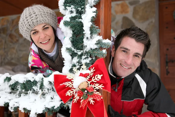 stock image Couple staying in a Christmas chalet