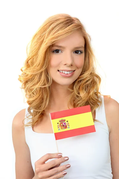 Attractive woman holding a Spanish flag — Stock Photo, Image