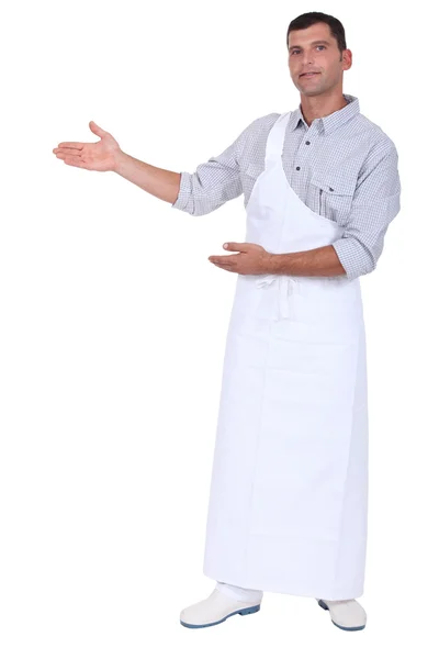 Butcher gesturing to blank copy space — Stock Photo, Image