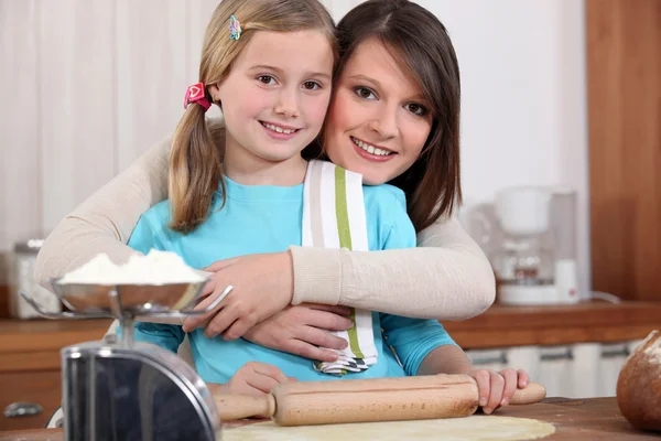 Little girl with rolling pin — Stock Photo, Image