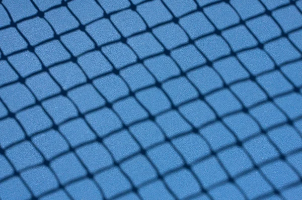 Pista de tenis Sombra neta — Foto de Stock