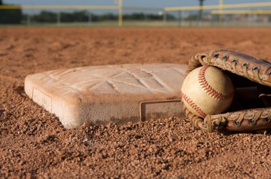 Baseball and Glove near Second Base clipart