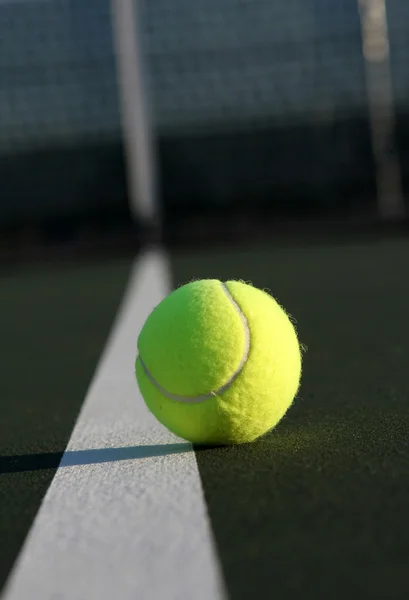 Angled View of a Tennis Ball on the Court — Stock Photo, Image