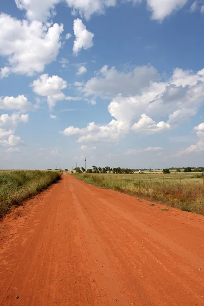 Estrada vermelha da sujeira — Fotografia de Stock
