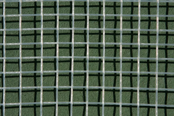Macro de cordas de raquete de tênis — Fotografia de Stock