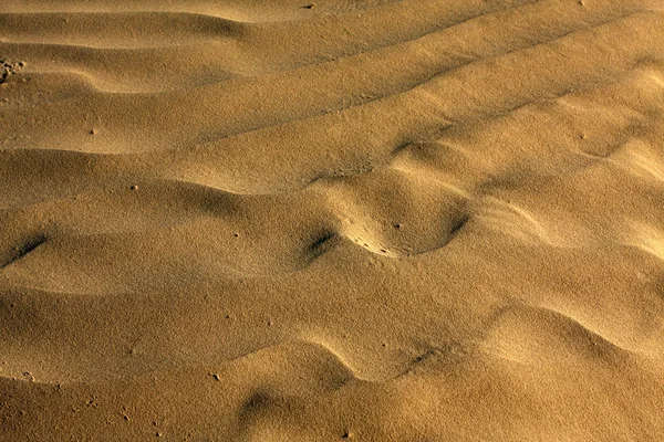 Motifs dans le sable de la plage — Photo