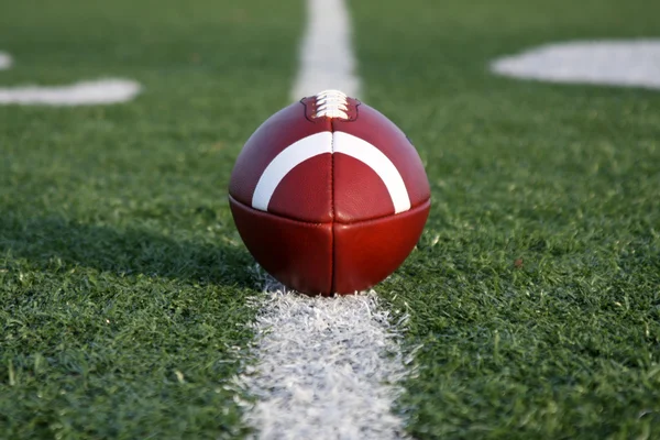 American Football Centered on the Line — Stock Photo, Image
