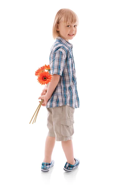 Παιδί με ανοιξιάτικα λουλούδια — Φωτογραφία Αρχείου