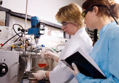 Scientists working at the laboratory clipart