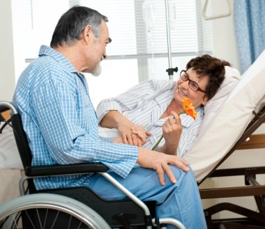 Senior couple in hospital clipart