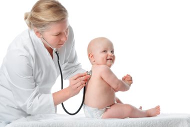 Female doctor examining child clipart