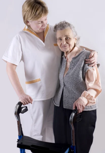 Pracownik opieki zdrowotnej i starszy — Zdjęcie stockowe