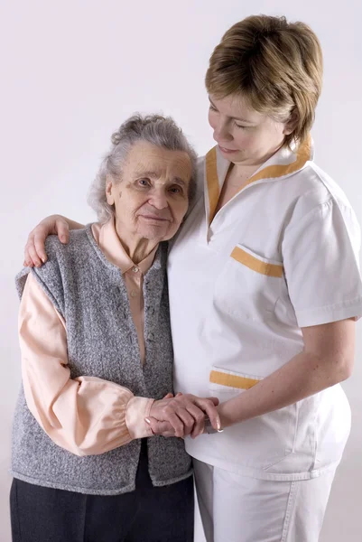 Healthcare worker and senior — Stock Photo, Image