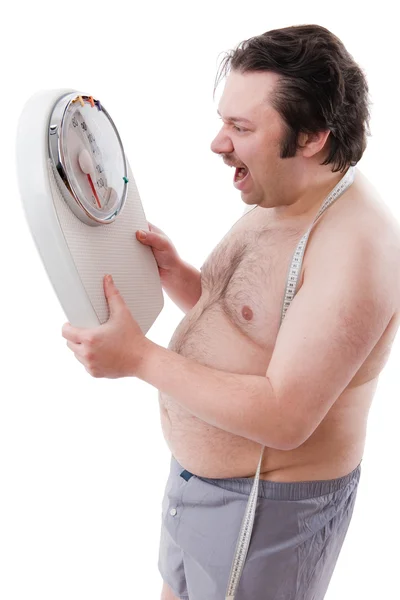 Uomo sovrappeso con la bilancia dei pesi — Foto Stock