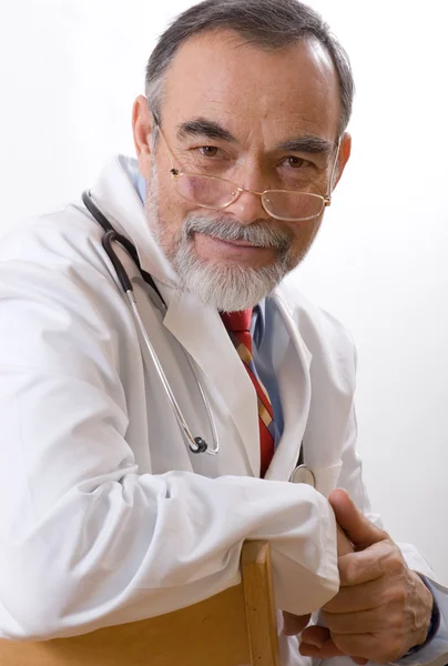 Caring doctor smiling Stock Photo