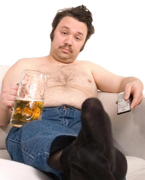 Overweight man with a beer glass Stock Image