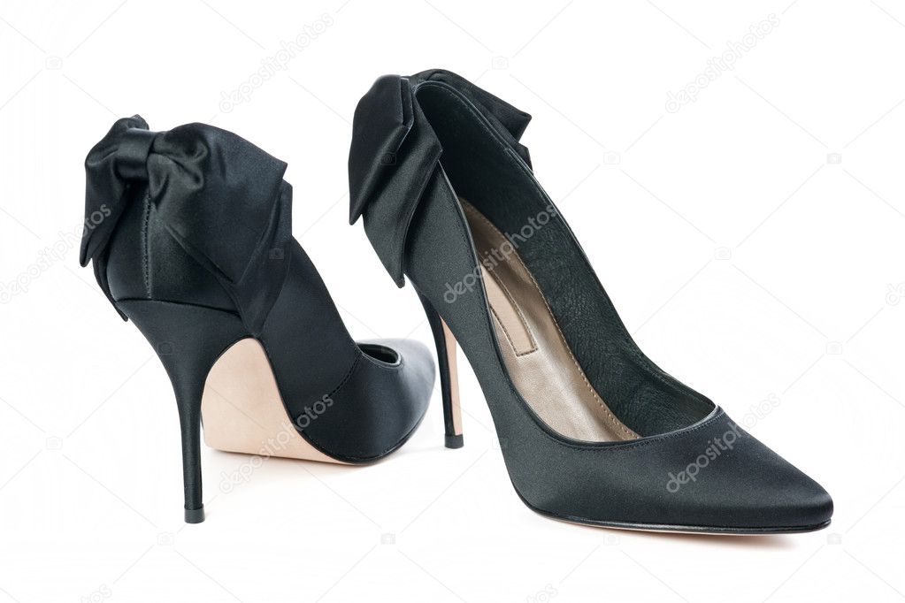 Black female shoes on a white background
