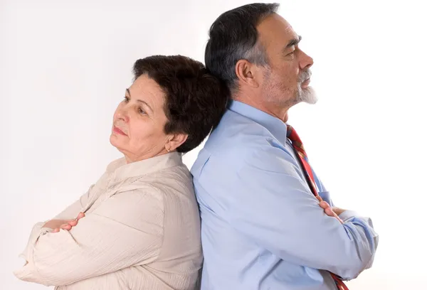 Couple standing back to back — Stock Photo, Image