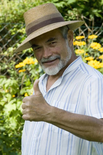 Senior showing thumb up — Stock Photo, Image