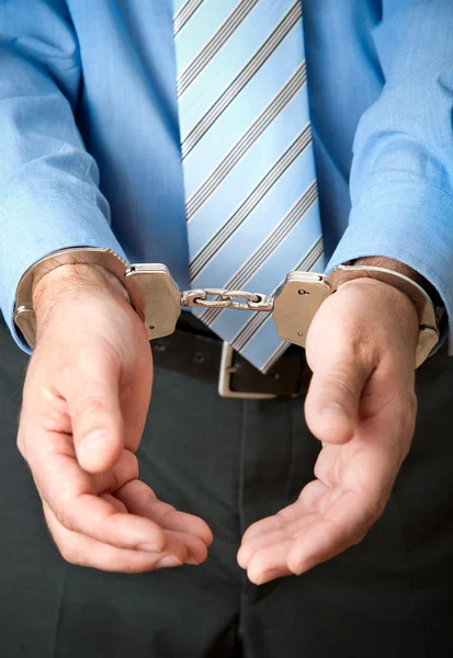 Бізнесмен в наручники — стокове фото