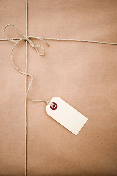 Brown paper parcel with copy space — Stock Photo, Image