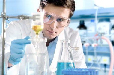 Scientist working at the laboratory clipart