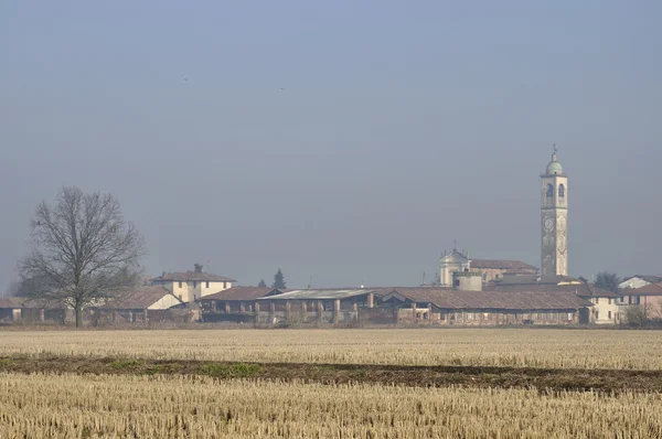 stock image Small country village in winter, lombardy