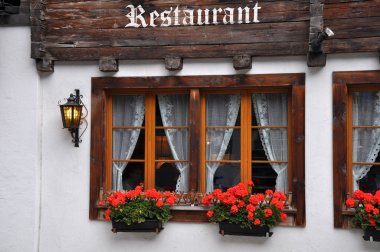 Sign and geranium, andermatt clipart