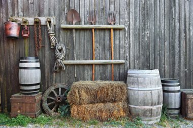 Barrel bale and fork in old barn