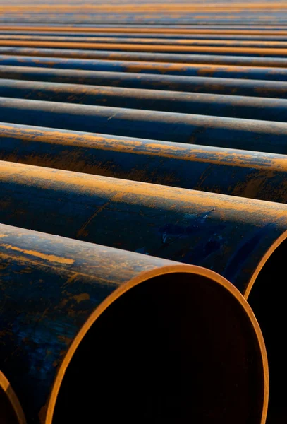 Pipes laid in a row — Stock Photo, Image