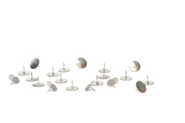 Metal tacks on a white background clipart