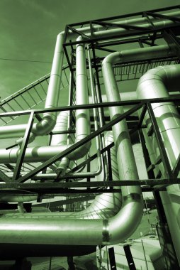 Industrial zone, Steel pipelines in green tones clipart