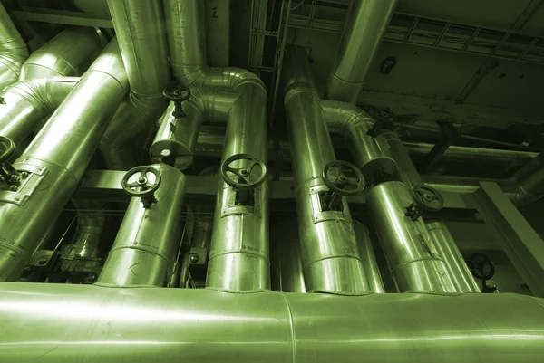 Industrial zone, Steel pipelines in green tones — Stock Photo, Image