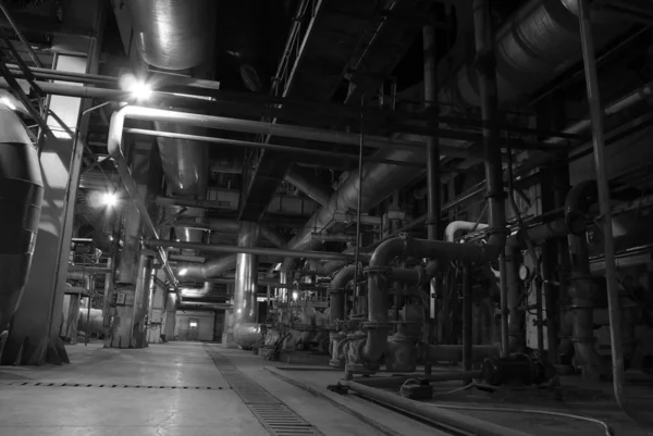 stock image Different size and shaped pipes at a power plant