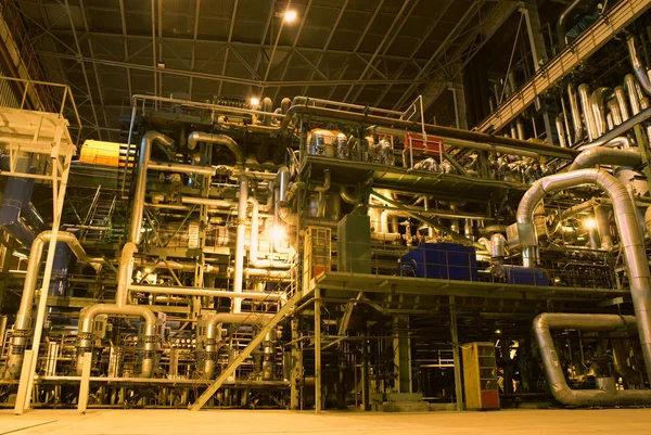 stock image Pipes, machinery, tubes and turbine at a power plant