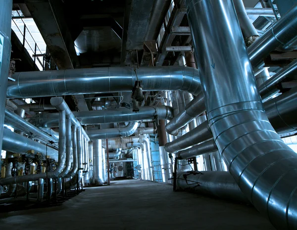 Pipes, tubes, valves, cables at a power plant — Stock Photo, Image