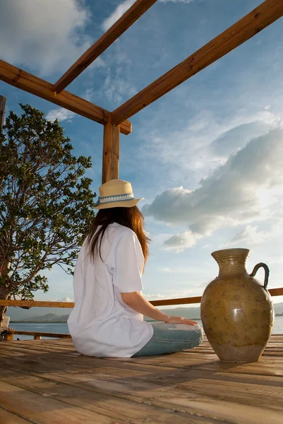 stock image Dance girl standing on the edge of waterfront Erhai Lake in Yunnan, China s