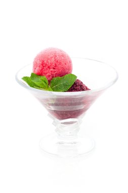 Delicious berry ice cream with mint leaves clipart