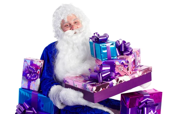 Santa Claus in blue with presents — Stock Photo, Image