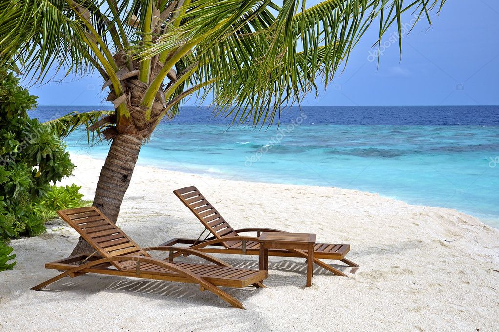 Two beach chairs against white sand — Stock Photo © beachboy #7137466